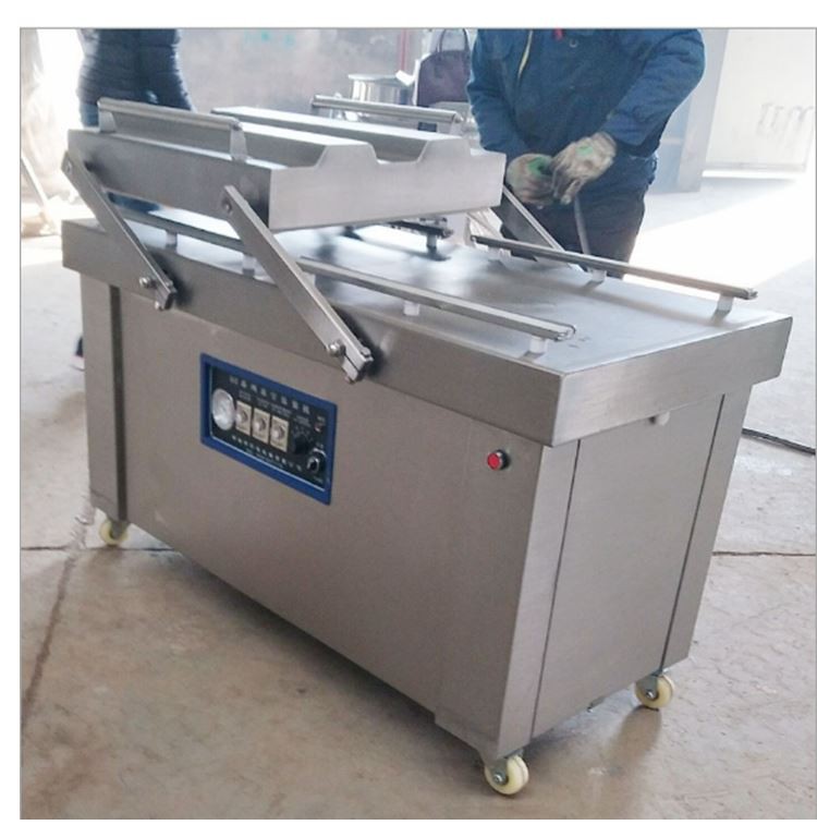 vacuum packaging mahcine.jpg 吸尘器打包jpg